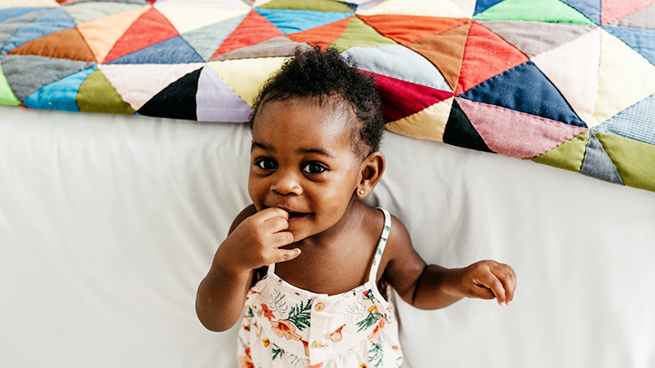 how to stop co-sleeping with your toddler, toddler girl by adult-size bed