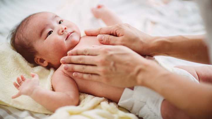 infant massage, baby getting a massage