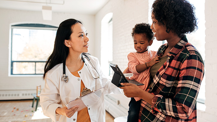 baby with mom at doctor's, varicella vaccine